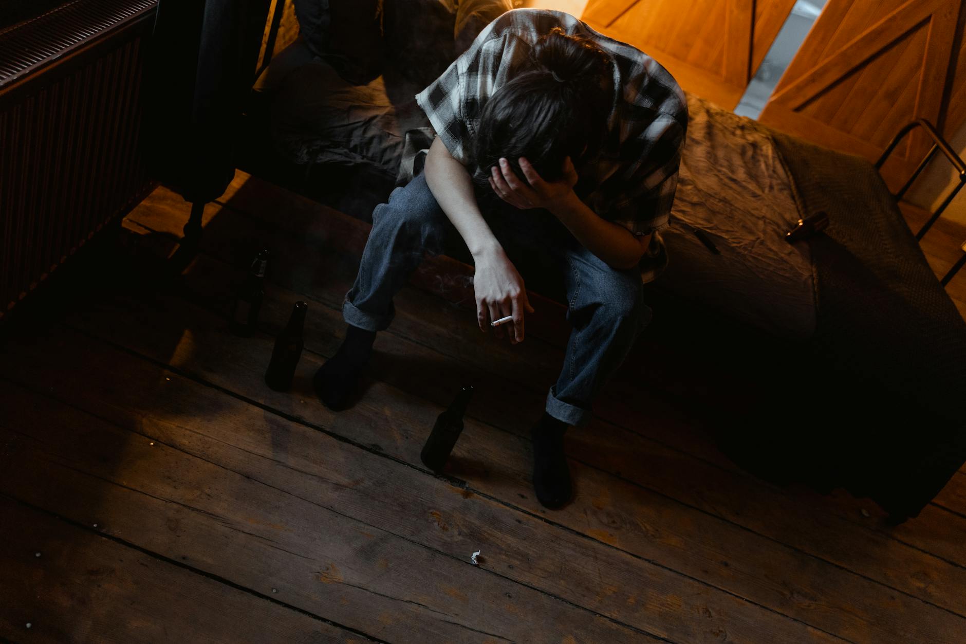 distressed man smoking cigarette